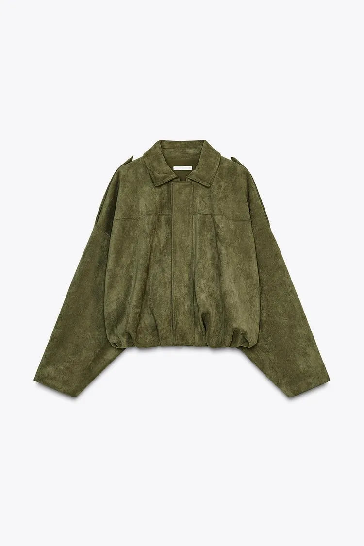 Green jacket on a light gray background